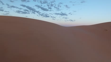 Aerial-drone-shot-discovering-gobi-desert-sand-dune-during-sunrise-in-mongolia